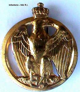R.I 94e.- Insigne berret